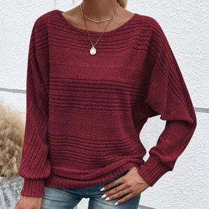 Top a righe con scollo tondo e maniche lunghe
