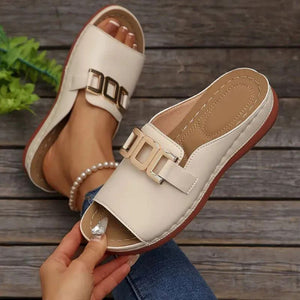 Pantofole aperte in pelle artificiale