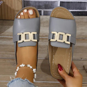 Pantofole aperte in pelle artificiale