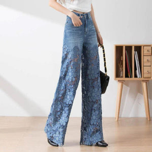 Pantaloni da donna in denim blu a vita alta con gamba larga e inserti in pizzo ritagliati
